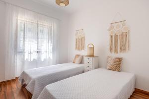 Postel nebo postele na pokoji v ubytování FLH Carvoeira House with Terrace