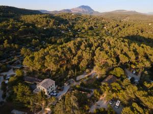 an aerial view of a building in the middle of a forest at Citykamp d'Aix-en-Provence in Aix-en-Provence +26 photos