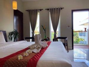 Φωτογραφία από το άλμπουμ του Rachna Mutita Residence σε Phumĭ Ta Phŭl