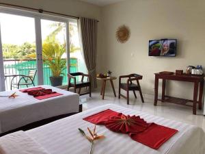 Φωτογραφία από το άλμπουμ του Rachna Mutita Residence σε Phumĭ Ta Phŭl