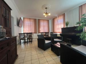 TV a/nebo společenská místnost v ubytování Aparthotel Mariazellerhof