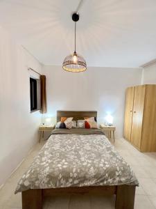 Postel nebo postele na pokoji v ubytování Be Happy Three-Bedroom Apartment