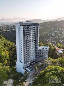 an aerial view of a tall white building at Maison De Tabasa near Tops Cebu in Cebu City