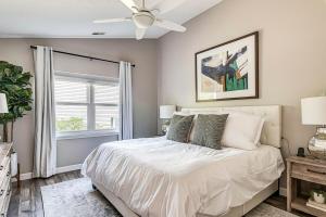 Ένα ή περισσότερα κρεβάτια σε δωμάτιο στο Elegant home in the heart of Westfield Perfect for family gatherings +25 φωτογραφίες