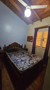 Postel nebo postele na pokoji v ubytování Casa en Barrio Ceramista 1 - Rawson