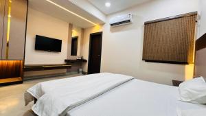 Μια τηλεόραση ή/και κέντρο ψυχαγωγίας στο The Station House Hotel +54 φωτογραφίες