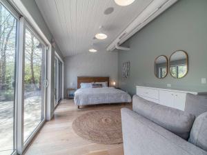Ένα ή περισσότερα κρεβάτια σε δωμάτιο στο The Guest House at Route 219