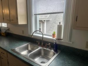 Kuchyň nebo kuchyňský kout v ubytování Boutique One Bedroom Apartment + 12 fotografií