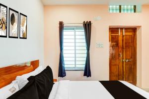 Ένα ή περισσότερα κρεβάτια σε δωμάτιο στο Super Hotel O Shine Inn +24 φωτογραφίες