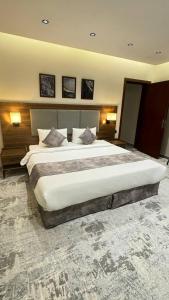 Ένα ή περισσότερα κρεβάτια σε δωμάτιο στο الروشان