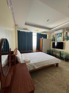 Televisyen dan/atau pusat hiburan di Hoàng Hải Anh Hotel +29 gambar
