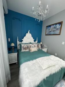 Ένα ή περισσότερα κρεβάτια σε δωμάτιο στο Apartamento no Centro de Barra Velha com vista para o Mar