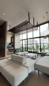 Giường trong phòng chung tại #1704 S# Lindo Flat decorado mobiliado- St. Bueno +50 ảnh