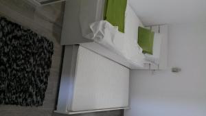 a room with a white cabinet and a green painting at Bozikovic 365 in Podstrana +63 photos