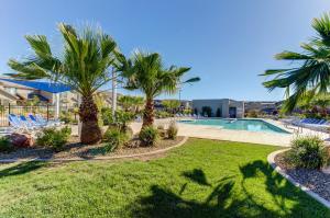 a resort with palm trees and a swimming pool at The Desert Star Villa in Washington