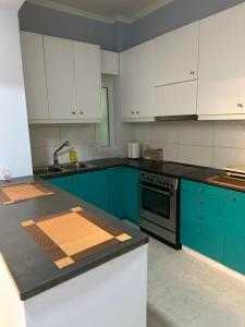 Kuchyň nebo kuchyňský kout v ubytování Lilia Apartments