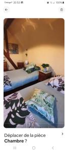 two beds sitting next to each other in a room at Chambre cosy in Buhl +27 photos