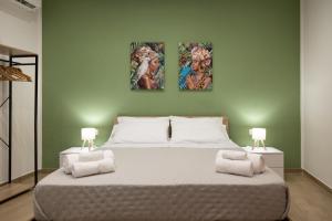 Postel nebo postele na pokoji v ubytování Lemora Luxury home-Vicino al centro storico