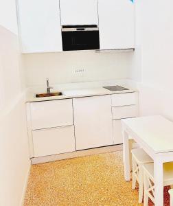 Kuchyň nebo kuchyňský kout v ubytování Ca' Corner dei Tacchi