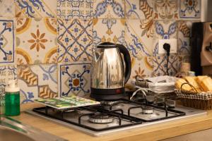 Kuchyň nebo kuchyňský kout v ubytování Lemora Luxury home-Vicino al centro storico + 47 fotografií