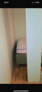 Ένα ή περισσότερα κρεβάτια σε δωμάτιο στο Rotana 2 apartment