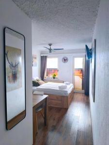 Ένα ή περισσότερα κρεβάτια σε δωμάτιο στο PAVLIN Bed & Breakfast