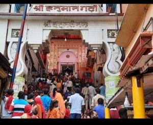a crowd of people walking through a market at Hotel Shree Rameshwaram Near by All Temple in Ayodhya