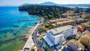an aerial view of a city and the ocean at Casa del Mar-Mon Repo Beachfront Apt near Airport in Anemómylos