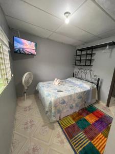 Ένα ή περισσότερα κρεβάτια σε δωμάτιο στο Vive en lo Natural +7 φωτογραφίες