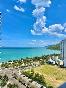 a view of the ocean from the balcony of a resort at FLC Sea Tower Quy Nhon Official in Quy Nhon