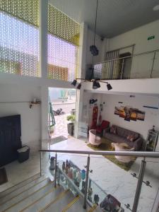a view of a living room from the second floor of a house at Hotel Oiti in Arauquita