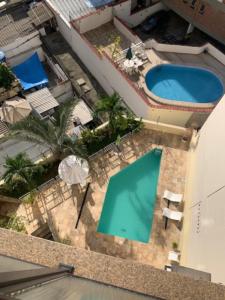 Bazén v ubytování Ipanema Magnifico nebo v jeho okolí