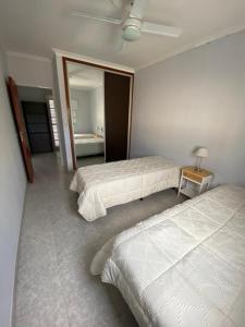 Ένα ή περισσότερα κρεβάτια σε δωμάτιο στο Duplex apartment for 5 people +2 φωτογραφίες