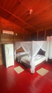 Postel nebo postele na pokoji v ubytování Luz Amazônia Lodge