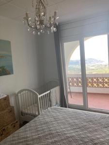 En eller flere senge i et værelse på Villa panoramique avec piscine, Mas-Fumats, ROSES, Espagne + 62 billeder
