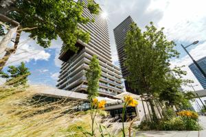 a tall building with plants in front of it at Wonderful Apartment with 2 bedrooms and pool and parking in Vienna