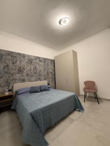 Ένα ή περισσότερα κρεβάτια σε δωμάτιο στο Vico Terzo Guest House