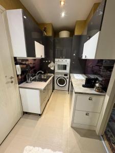 Kuchyň nebo kuchyňský kout v ubytování Marpey