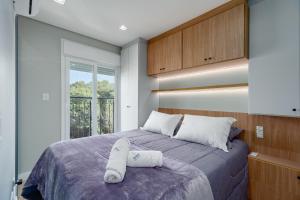 Una cama o camas en una habitación de Apto no Residencial Aire 1 dorm by Achei Gramado