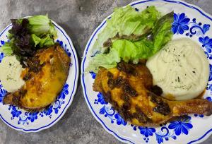 two plates of food with meat and salad on them at Romantic Dome & French Cuisine in Jantetelco +21 photos