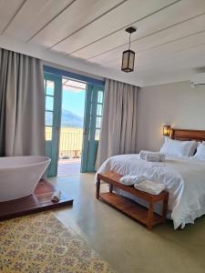 Giường trong phòng chung tại La Villa Novas Pousada +22 ảnh