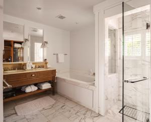 a bathroom with a tub and a sink and a shower at El Encanto Santa Barbara in Santa Barbara +42 photos