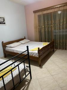 Ένα ή περισσότερα κρεβάτια σε δωμάτιο στο Emanuel