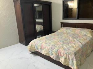 Ένα ή περισσότερα κρεβάτια σε δωμάτιο στο Kenda house