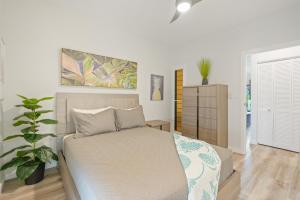 Postel nebo postele na pokoji v ubytování Garden Breeze Retreat at Kaha Lani Resort 103 + 42 fotografií