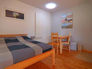 Postel nebo postele na pokoji v ubytování Ferienwohnung am Oase am Vilzsee + 46 fotografií