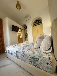 a bedroom with a bed and a door at Marshall property in Tangier +42 photos