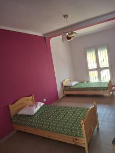 Afbeelding uit fotogalerij van Full house with two bedrooms for seven bead in Mohammed Ben Bel Kassem