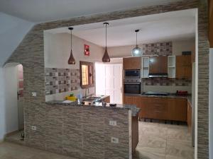 Afbeelding uit fotogalerij van Full house with two bedrooms for seven bead in Mohammed Ben Bel Kassem +8 foto's