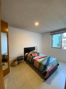 Ένα ή περισσότερα κρεβάτια σε δωμάτιο στο Comfortable Home near everything
